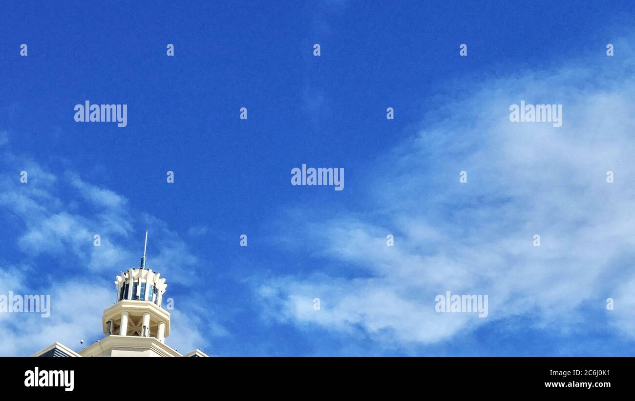 Shenzhen, China: residential buildings under blue sky and white clouds ...