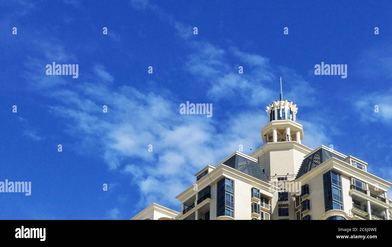 Shenzhen, China: residential buildings under blue sky and white clouds ...