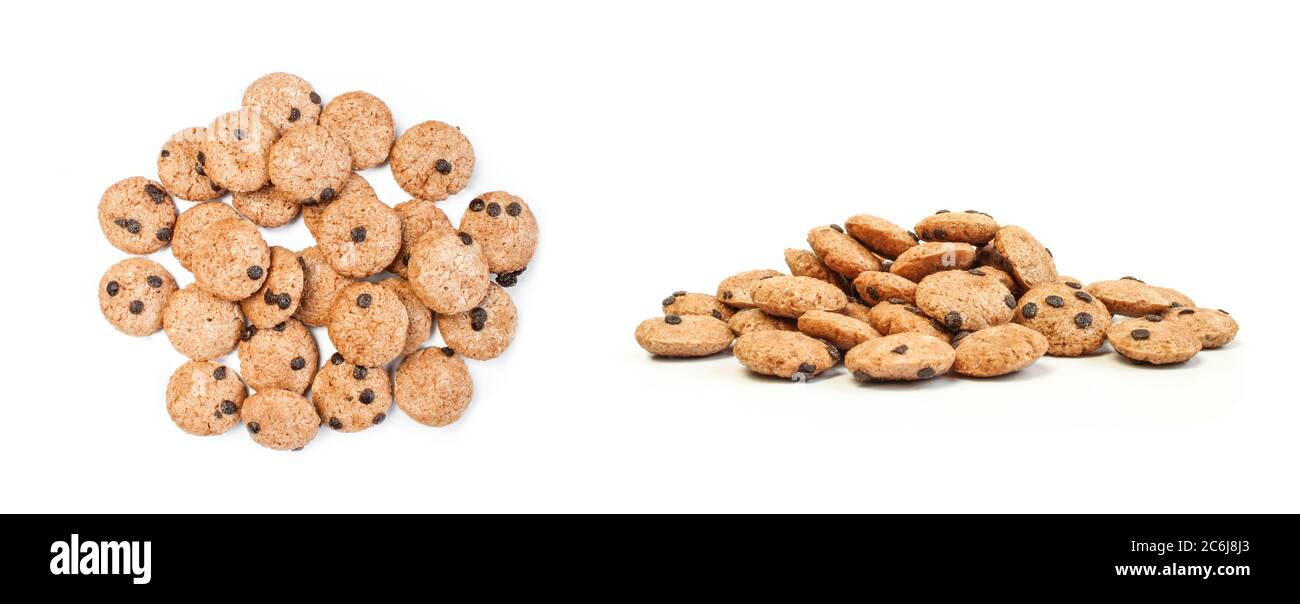 Pile of dry cookies from different angles isolated on white background. Crunchy flakes/cereals
