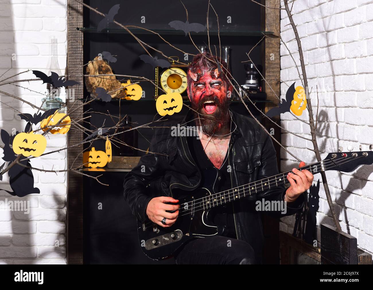 Monster playing electric guitar hi-res stock photography and images - Alamy