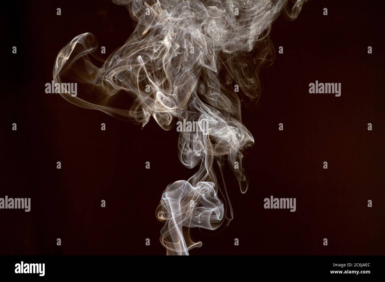 Smoke isolated on dark background Stock Photo