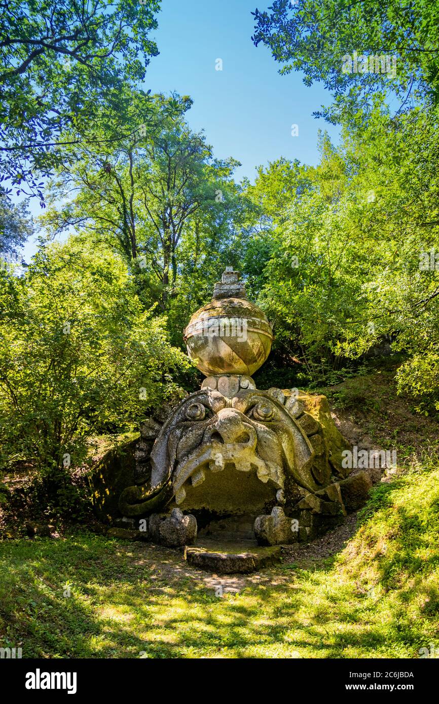 June 28, 2020 - Sacro Bosco (Sacred Grove) or Park of the Monsters of Bomarzo - Mannerist monumental garden. Proteus or Glaucus, with its mouth wide o Stock Photo