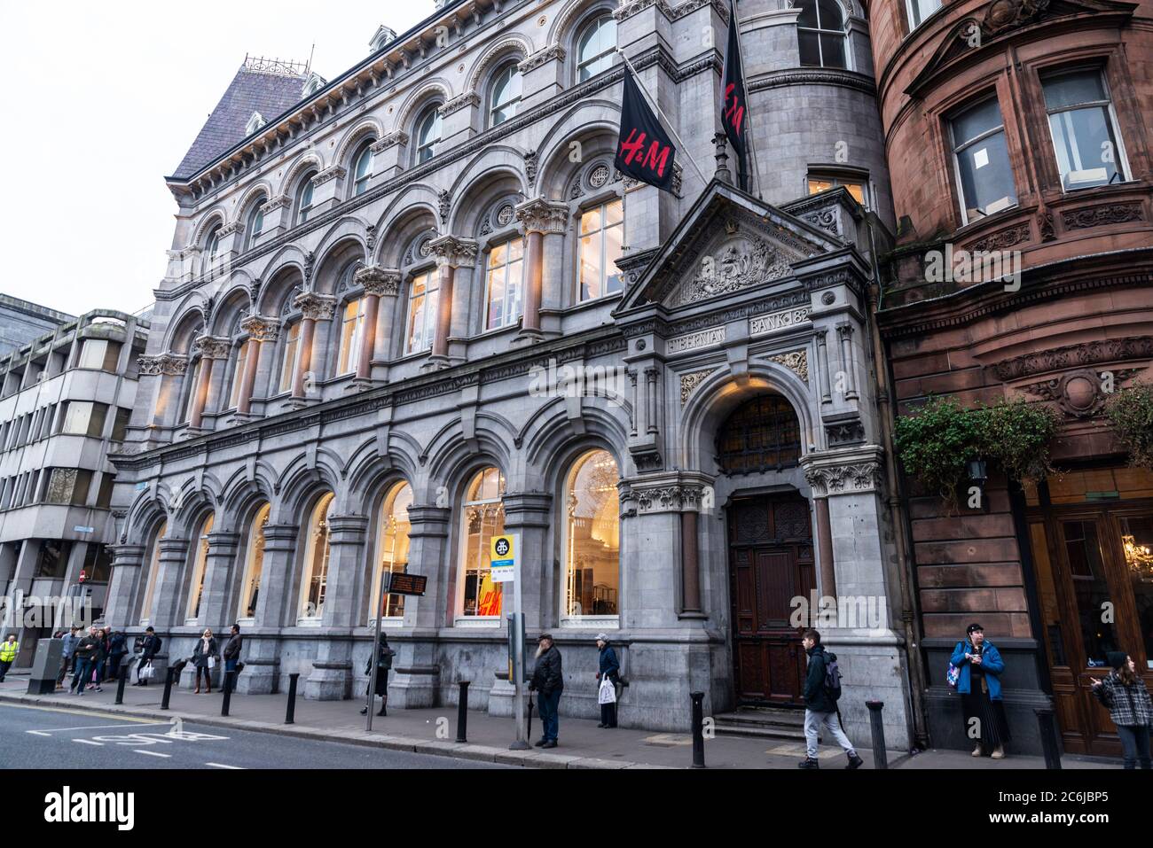 Dublin, Ireland - December 30, 2019: Facade of a HM or H&M clothing store  with people around in Dame street of Dublin, Ireland Stock Photo - Alamy