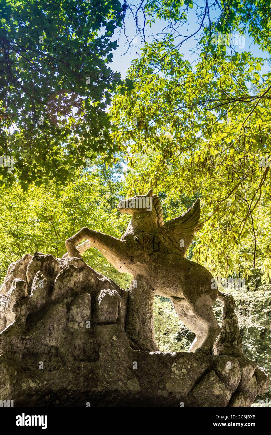 June 28, 2020 - Sacro Bosco (Sacred Grove) or Park of the Monsters of Bomarzo - Mannerist monumental garden. Statue of Pegasus, the winged horse. Stock Photo