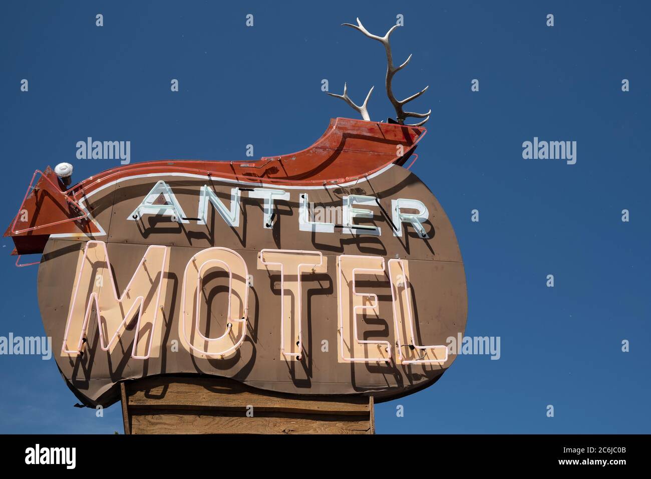 Jackson, Wyoming - June 26, 2020: Sign for the Antler Motel, located in downtown Jackson Hole. Retro, midcentury style neon sign Stock Photo