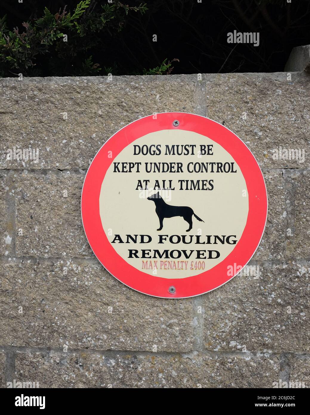 July 2020 - Dogs must be kept under control at all time and fouling removed sign in Brean, Somerset, UK Stock Photo