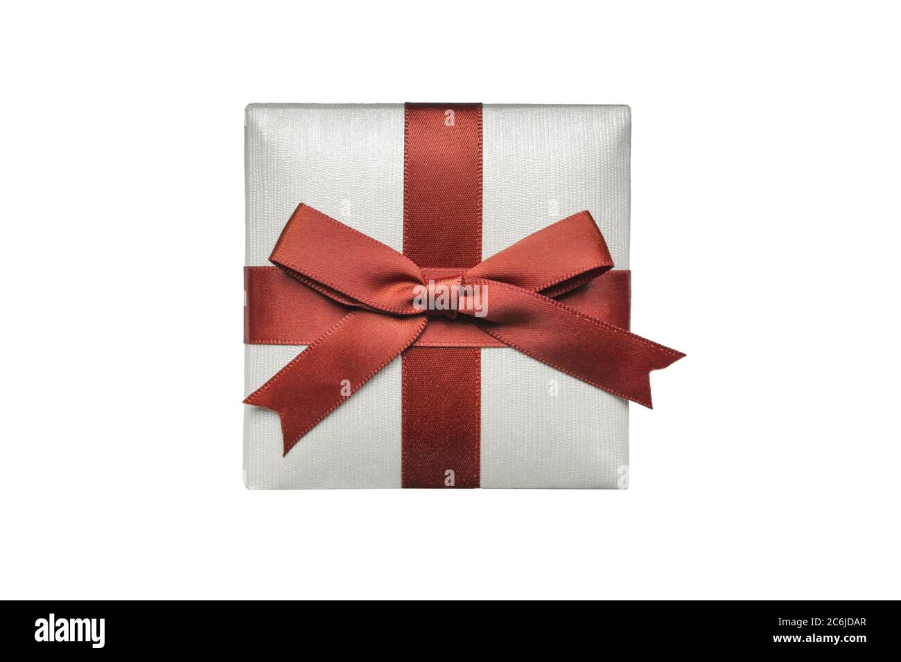 Gift box with dark red ribbon isolated on white background. Close up of  decoration jewelry box Stock Photo - Alamy