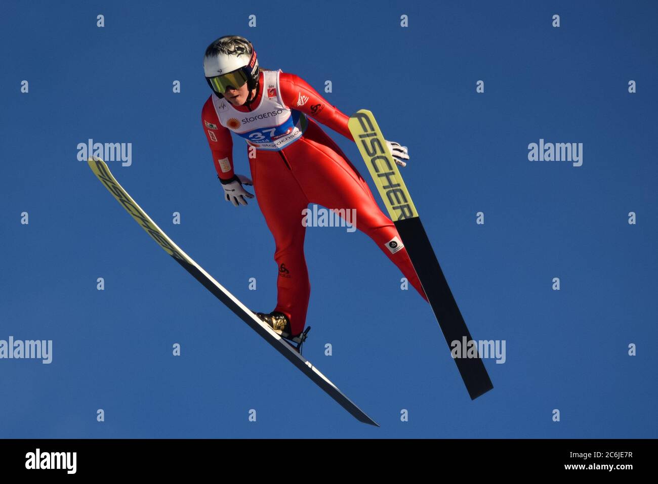 Ski jumpers jump from the large hill at the Nordic World Championships, Seefeld, Austria, 2019. Stock Photo