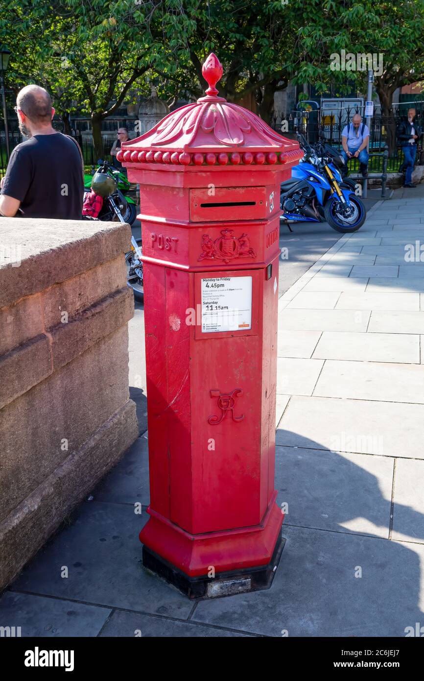 Victorian hexagonal Post Box close to City Hall and market, dated 1886. Norwich, Norfolk, UK - August 22nd 2015 Stock Photo