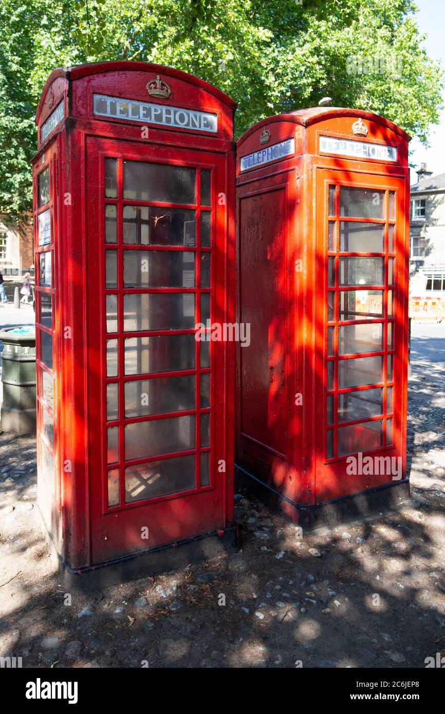 Two classic old red telephone boxes, Norwich, Norfolk, UK - August 22nd 2015 Stock Photo