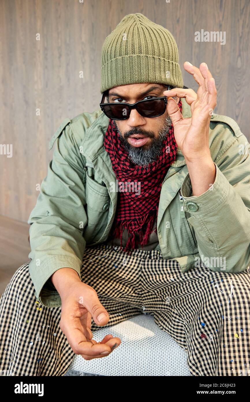 Hamburg, Germany. 10th July, 2020. Rapper Samy Deluxe wears sunglasses before an interview as part of the presentation of a new eyewear collection. Credit: Georg Wendt/dpa/Alamy Live News Stock Photo