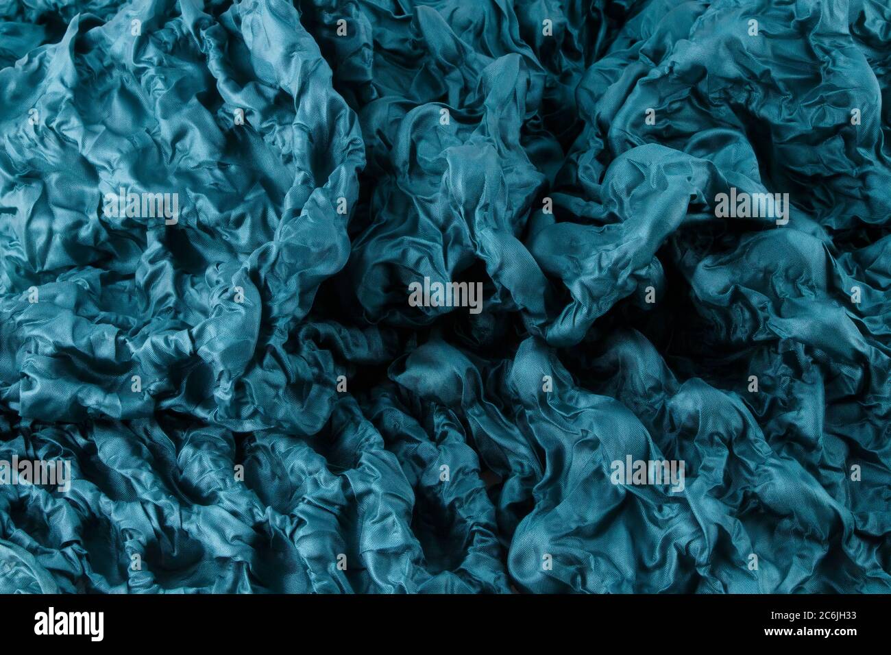 Cerulean Blue Textured silky Fabric Background Stock Photo