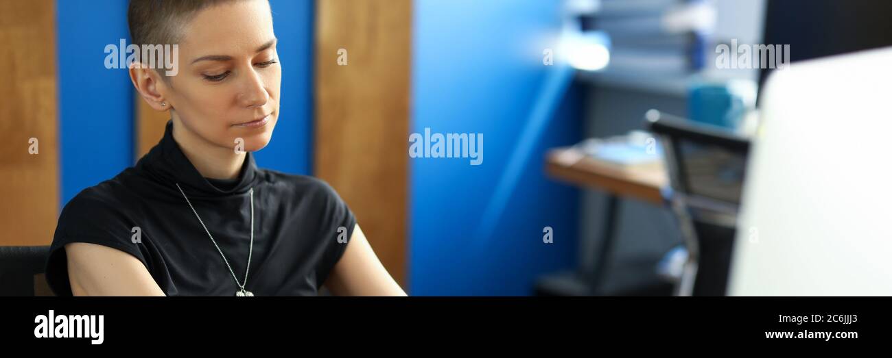 Woman in black top indoors hi-res stock photography and images - Alamy