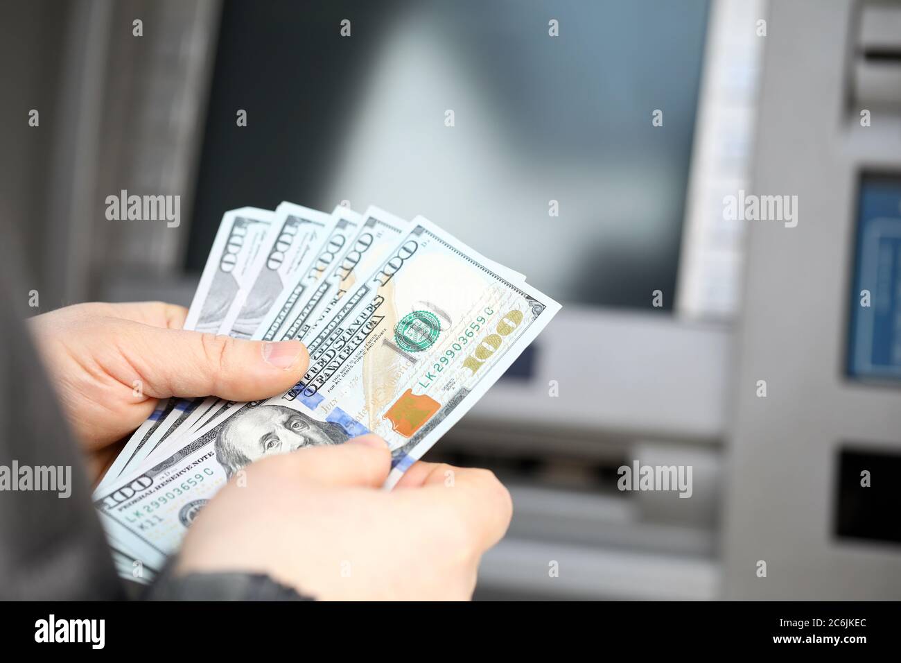 Successful male holding salary Stock Photo