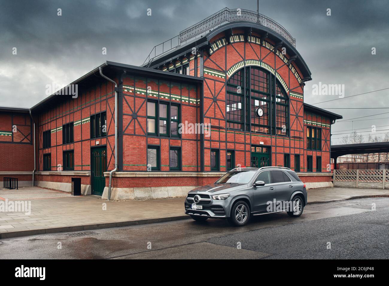 Ruda Slaska / Poland - 01/11/2020: Luxury Mercedes GLE parked in front of the historic station. The V6 362KM engine and hydropneumatic suspension make Stock Photo