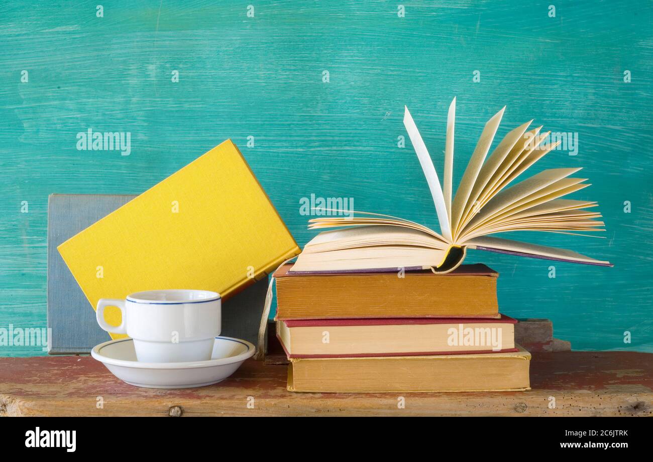 boks with a cup of coffee, learning / education concept Stock Photo