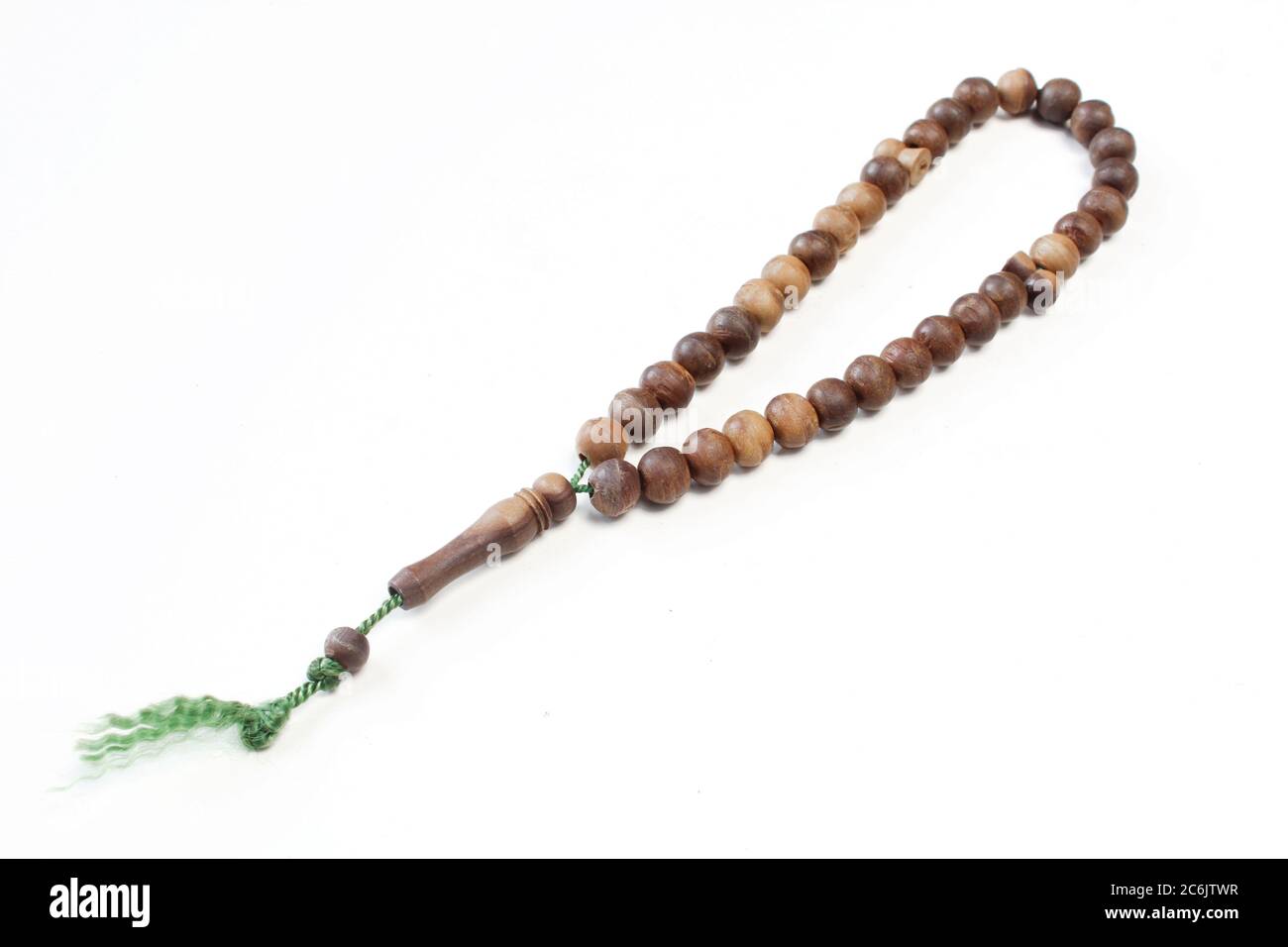 Muslim prayer beads on white background. Rosary made of close up isolated Stock Photo
