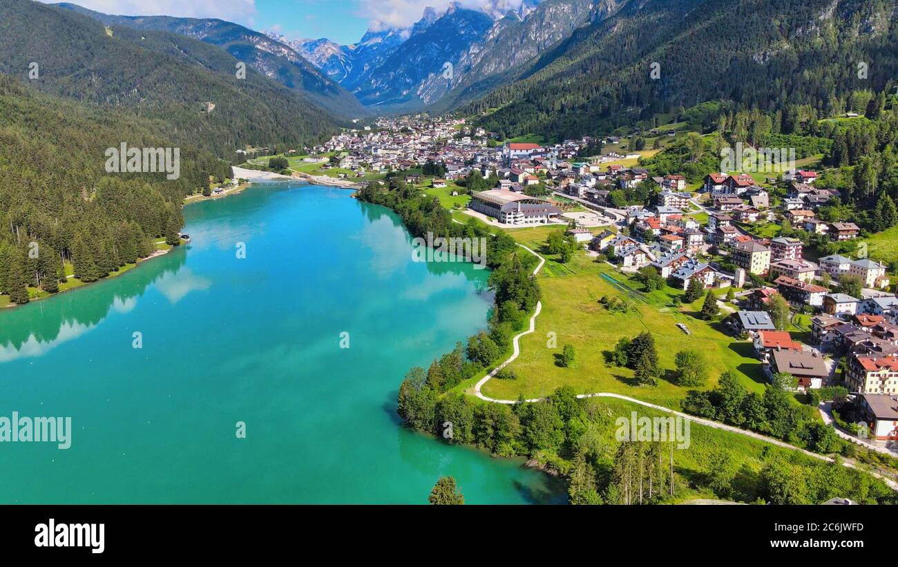 Aerial view of Auronzo Lake and Town in summertime, italian dolomites. Stock Photo