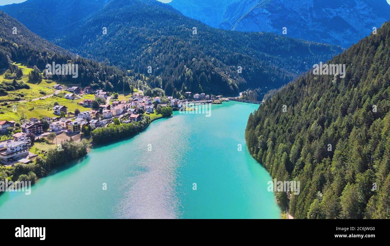 Aerial view of Auronzo Lake and Town in summertime, italian dolomites. Stock Photo