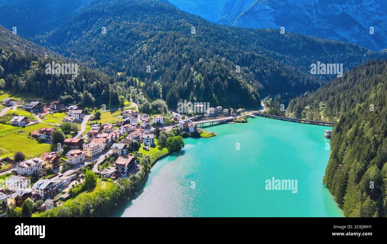 Alpin lake and dam in summertime, view from drone, Auronzo, italian dolomites. Stock Photo