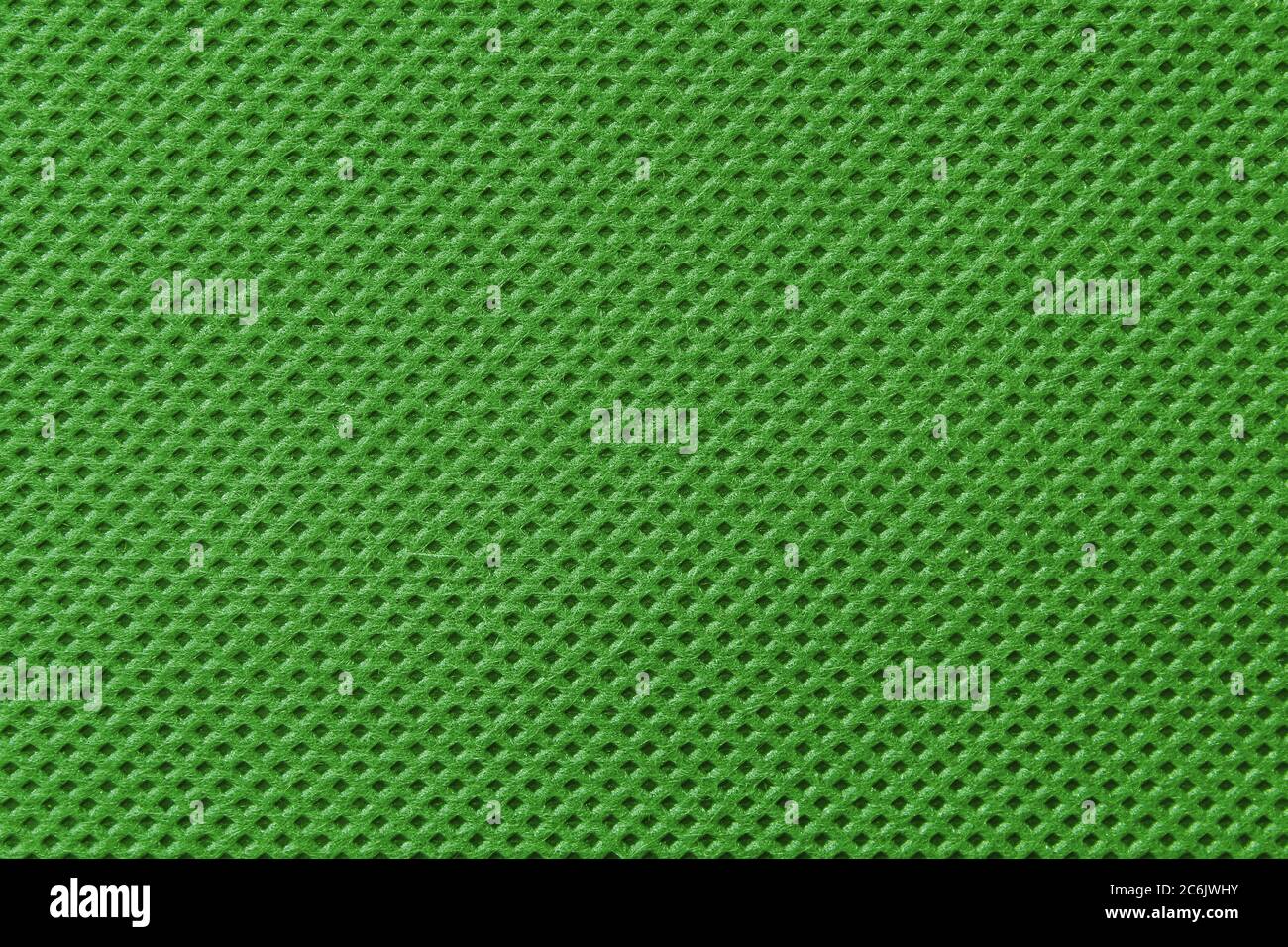 Green fabric textile close up pattern background Stock Photo