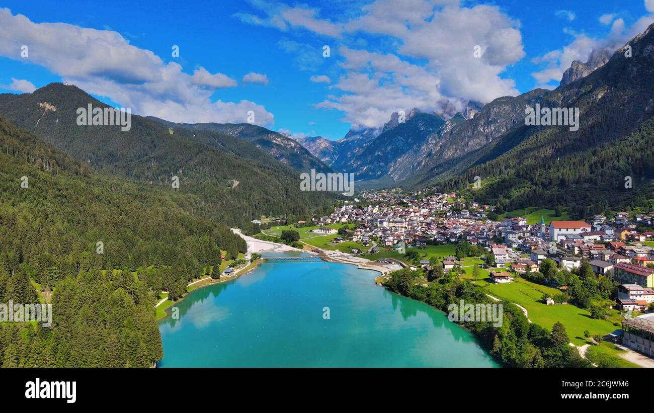 Aerial view of Auronzo Lake and Town in summertime, italian dolomites. Stock Photo