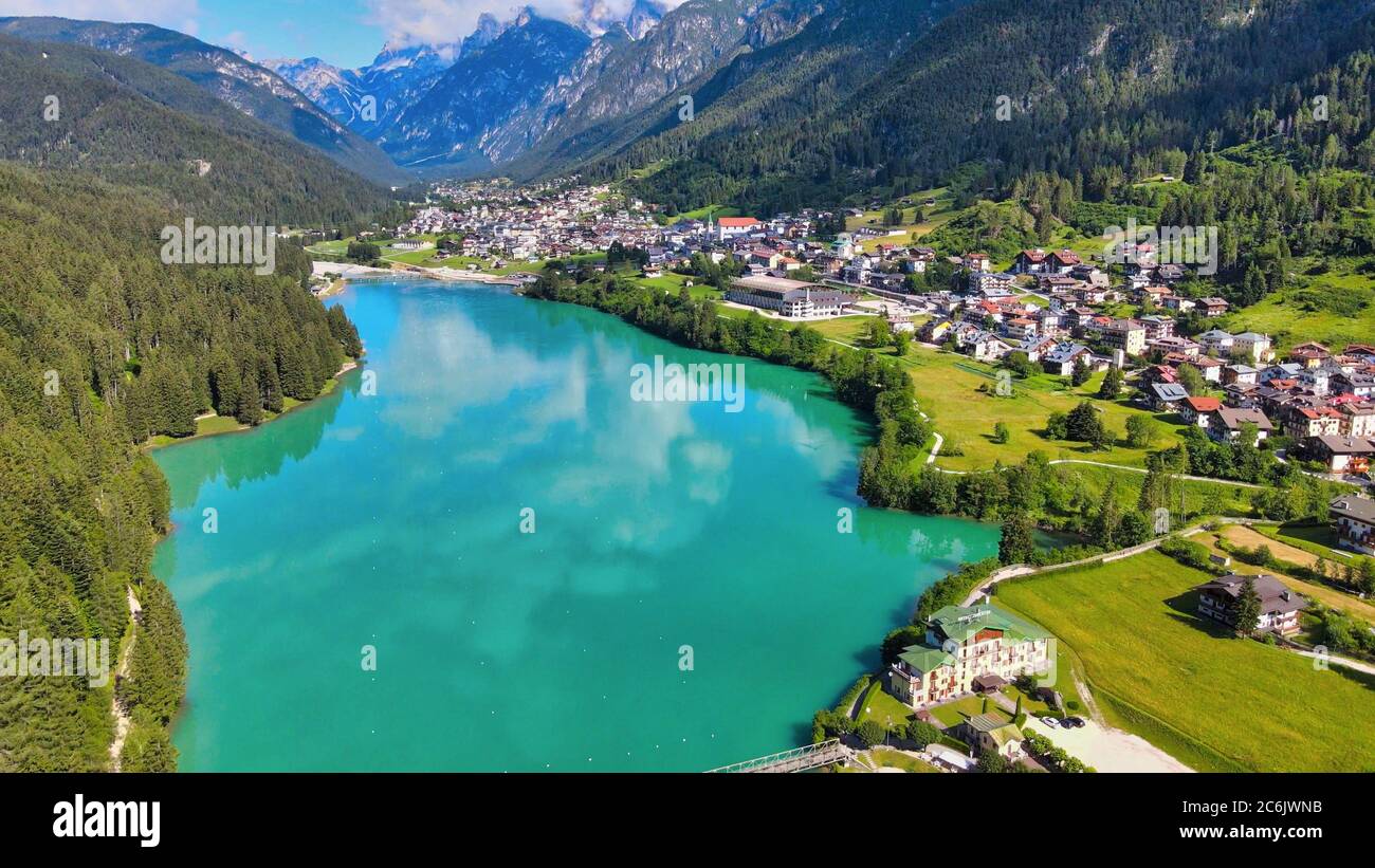 Aerial view of Auronzo Lake and Town in summertime, italian dolomites. Stock Photo