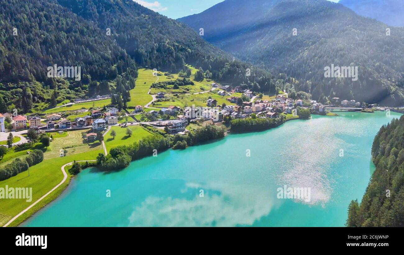 Aerial view of Auronzo Lake and Town in summertime, italian dolomites. Stock Photo