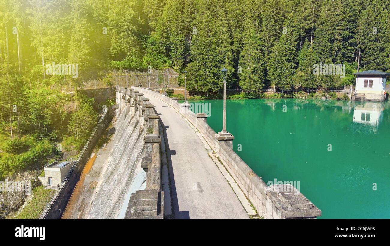 Alpin lake and dam in summertime, view from drone, Auronzo, italian dolomites. Stock Photo
