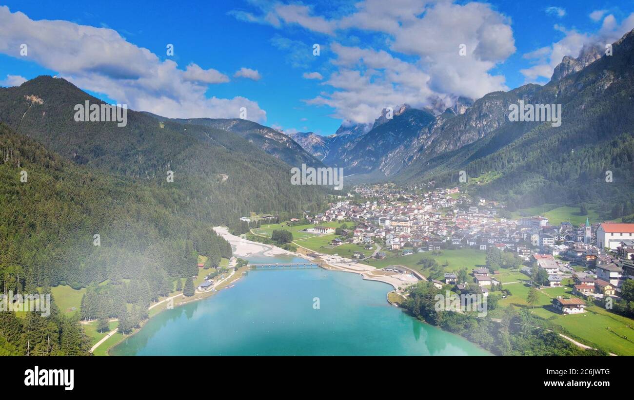 Aerial view of Auronzo Lake and Town in summertime, italian dolomites. Stock Photo