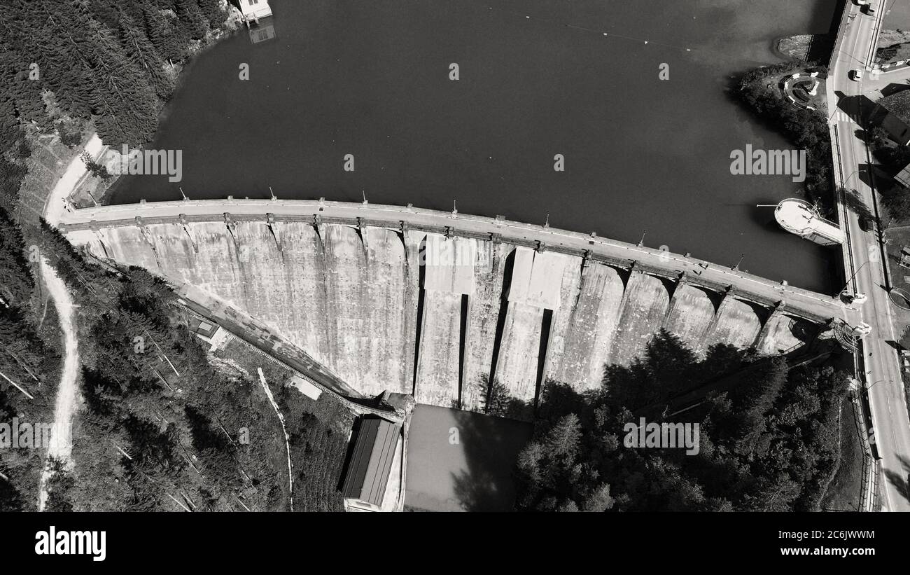 Alpin lake and dam in summertime, view from drone, Auronzo, italian dolomites. Stock Photo