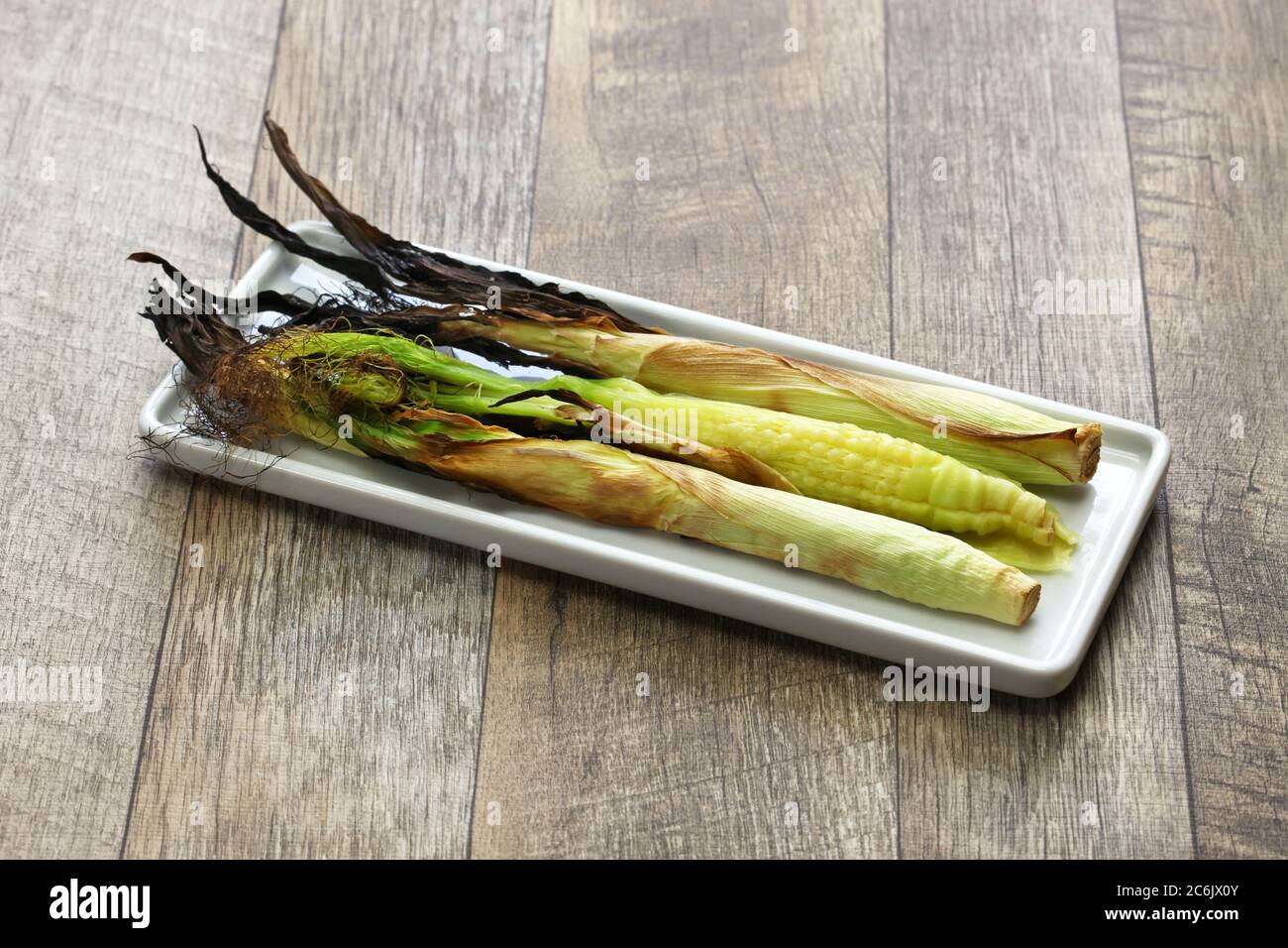 grilled whole baby corn, appetizer Stock Photo