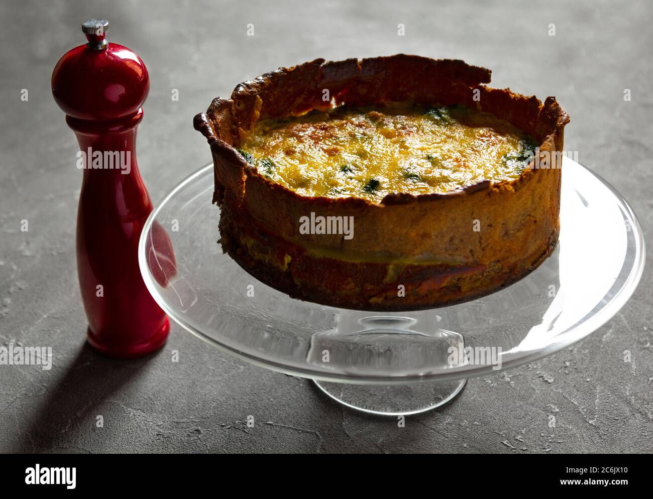 Homemade French pie or Quiche lorraine salmon pie served on a glass