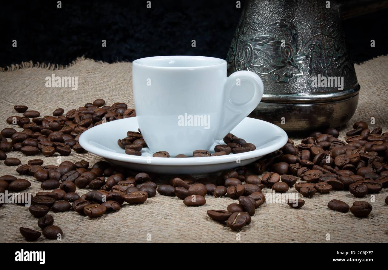 https://c8.alamy.com/comp/2C6JXF7/coffee-copper-and-white-cup-greek-coffee-with-water-and-coffee-pot-turkish-coffee-and-beans-white-mug-cafe-2C6JXF7.jpg