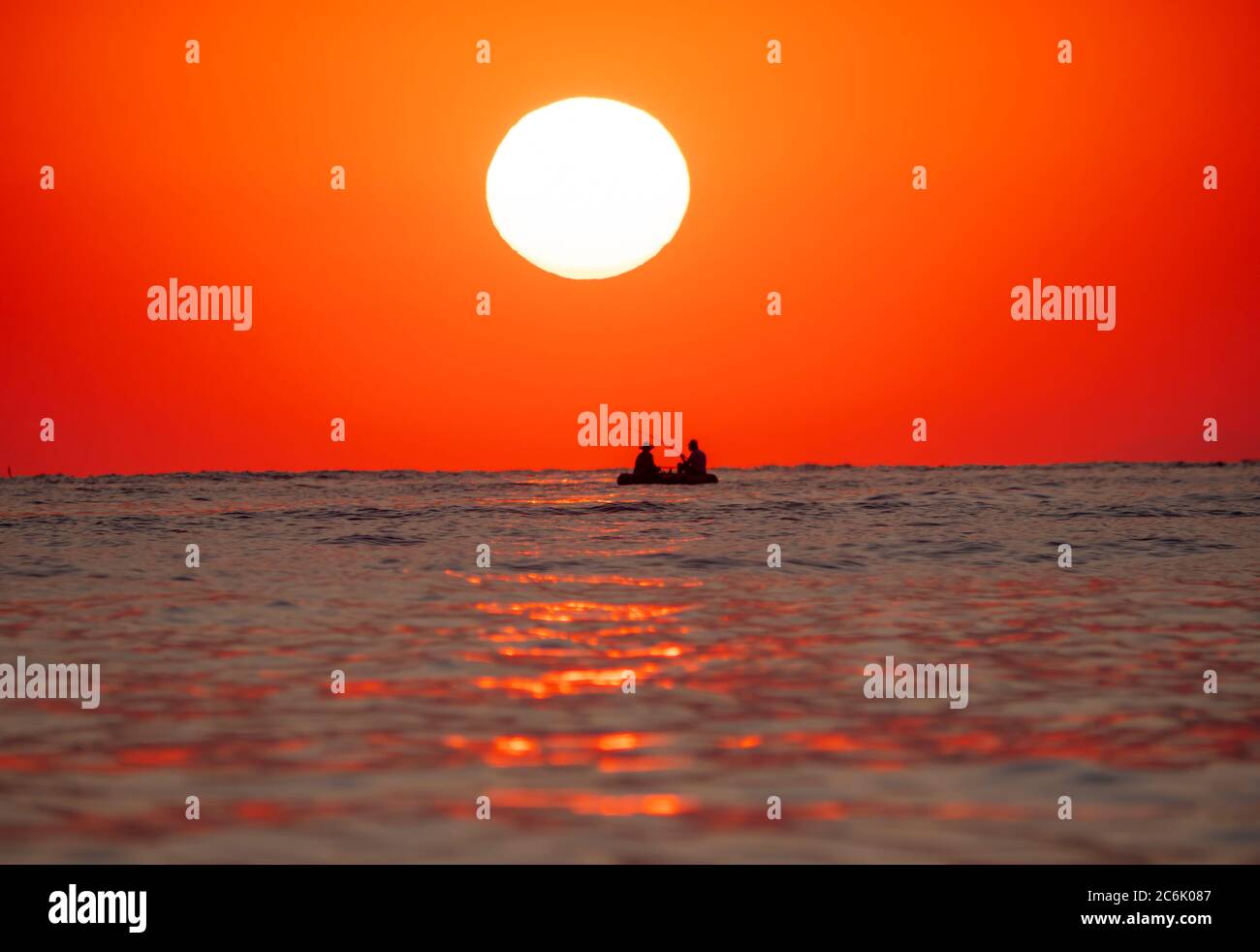 big sun down over sea sunrise, red sky Stock Photo - Alamy