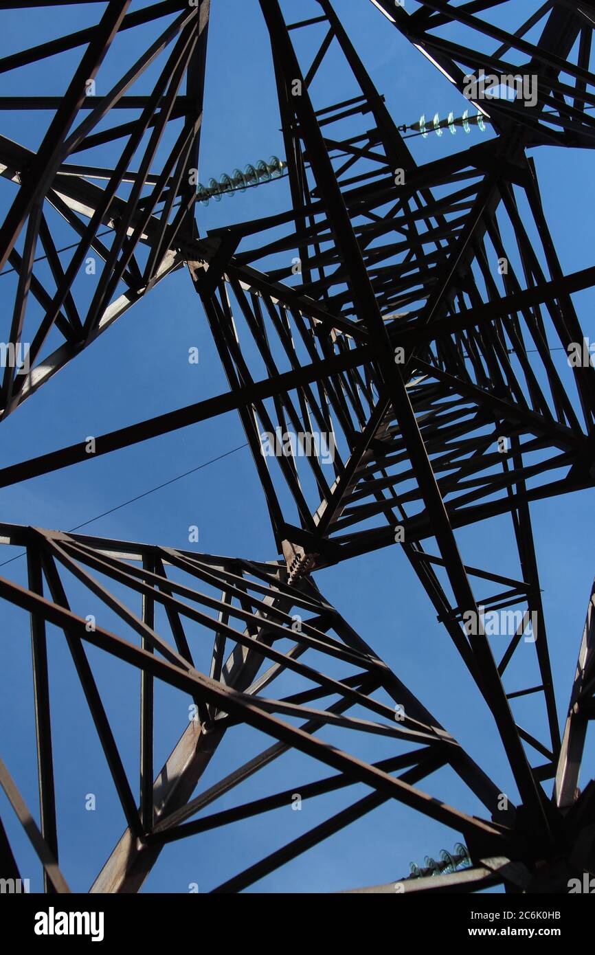 High voltage tower construction against the sky, bottom view Stock ...