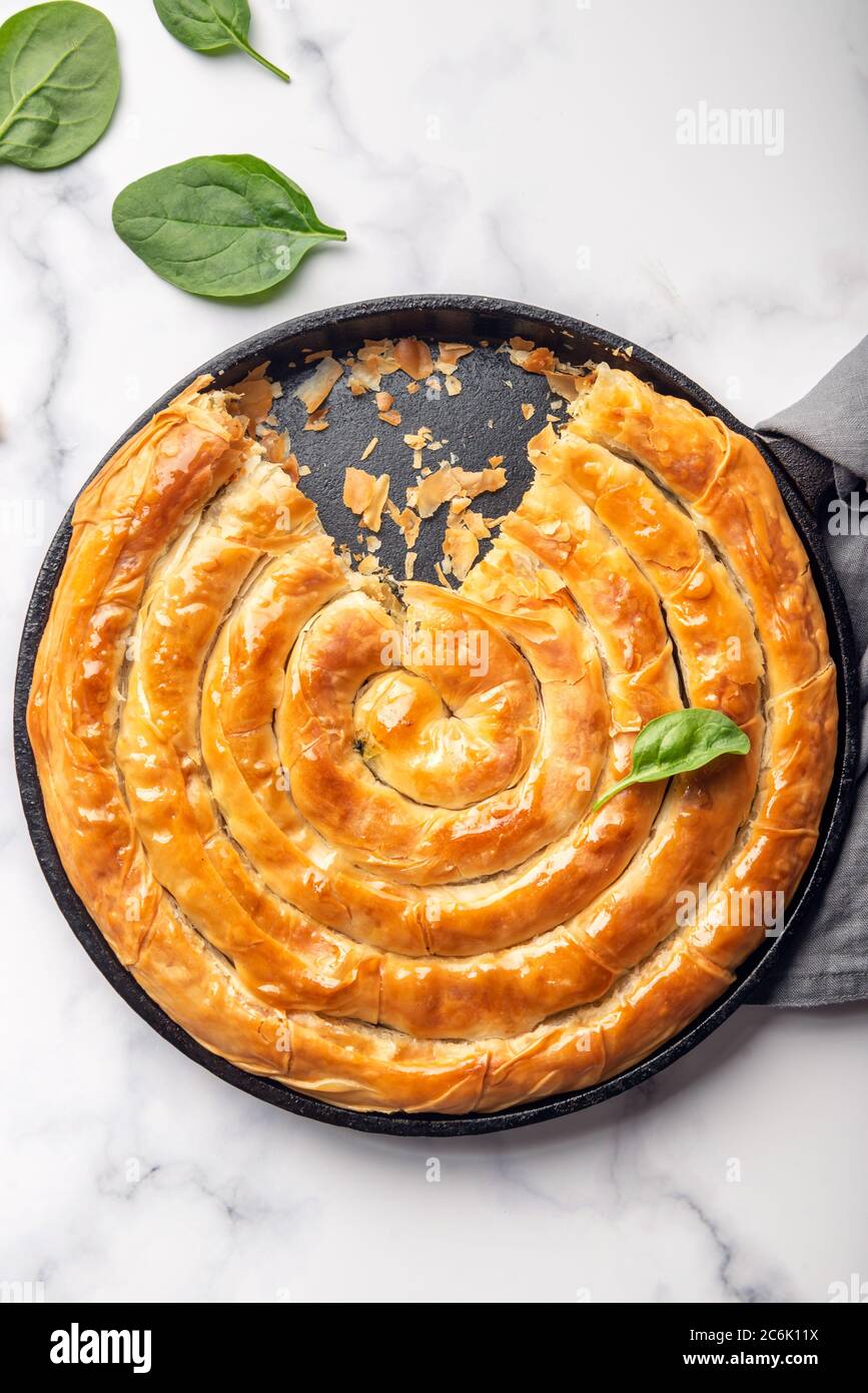 Filo Spinach and Feta Twist Pie Stock Photo - Alamy