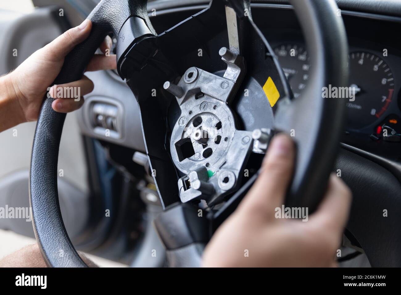 Close Up car steering wheel repair after the accident. Disconnecting of