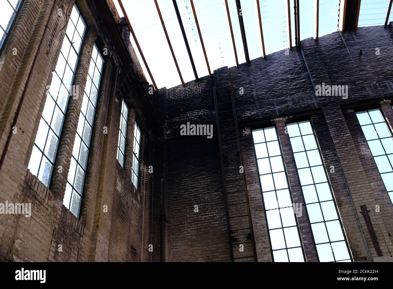 the interior of an abandoned industrial warehouse building on old industrial park called Hembrug in the netherland Stock Photo