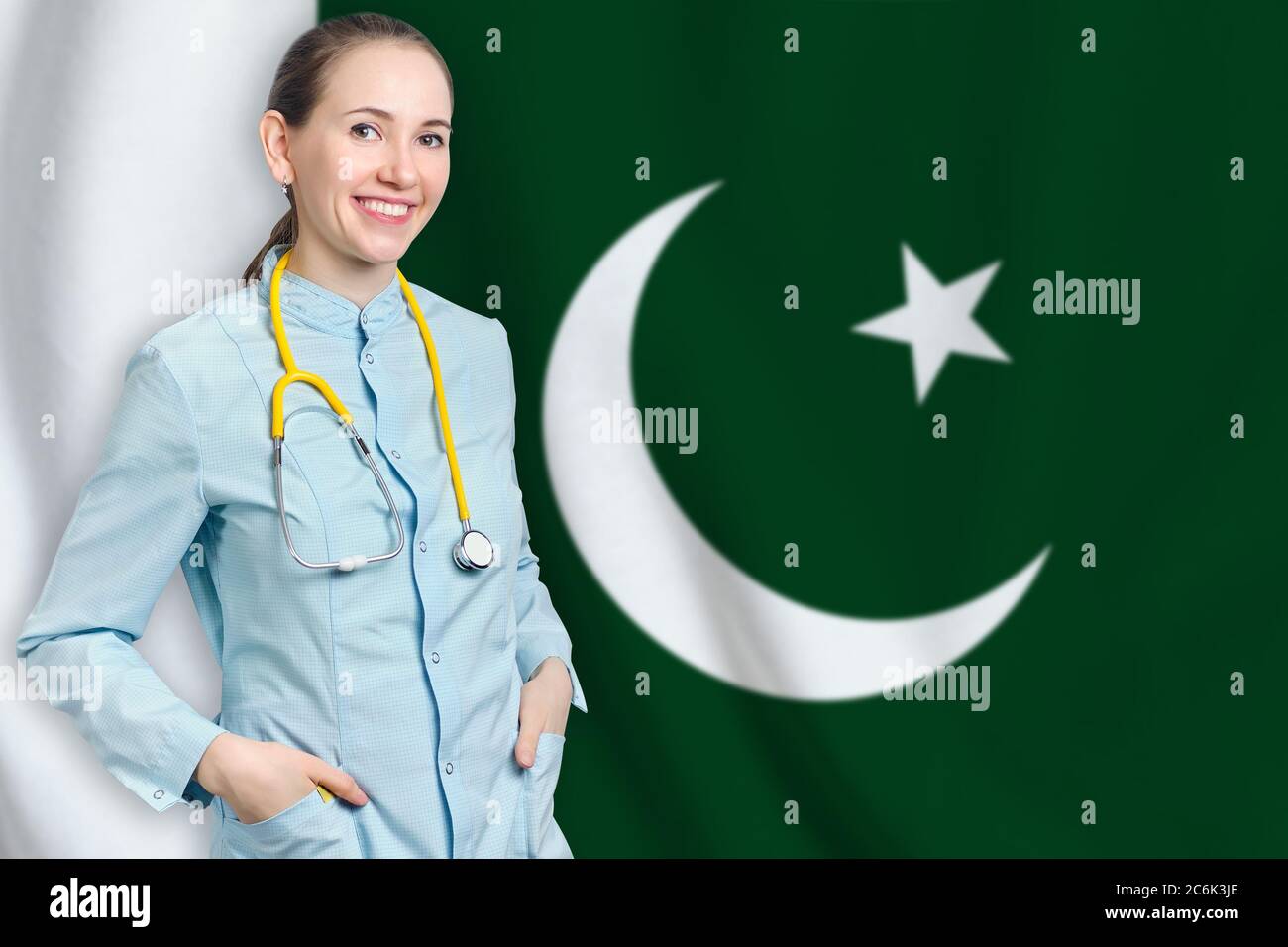 Islamic Republic of Pakistan healthcare concept with doctor on flag background. Medical insurance, work or study in the country Stock Photo