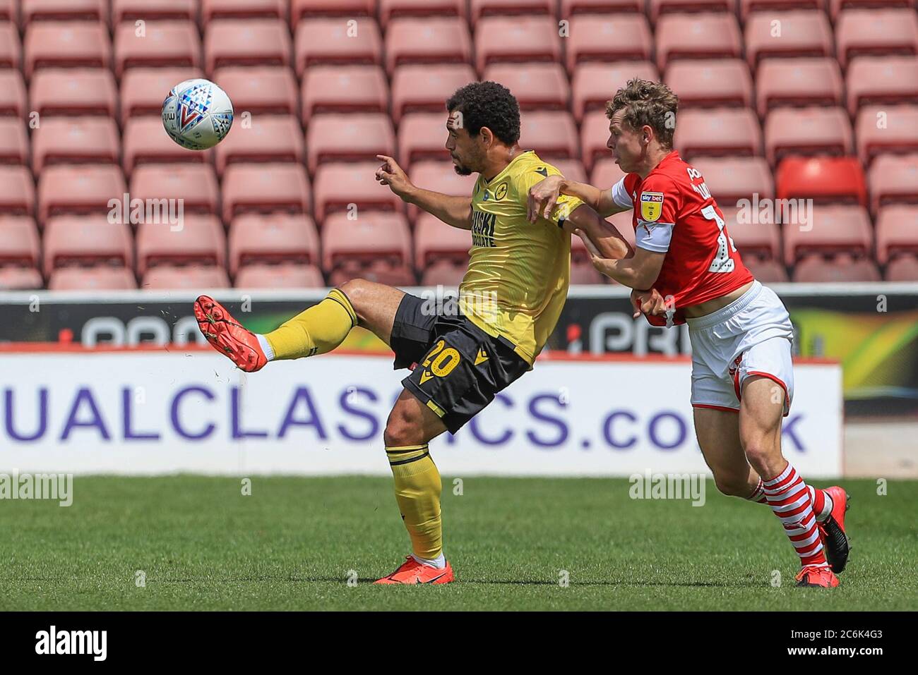 Mason Bennett 20 Of Millwall Holds Off Kilian Ludewig 14 Of Barnsley Stock Photo Alamy