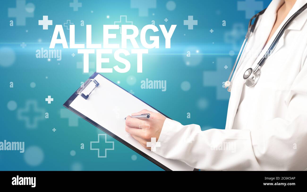 doctor writes notes on the clipboard with ALLERGY TEST inscription ...