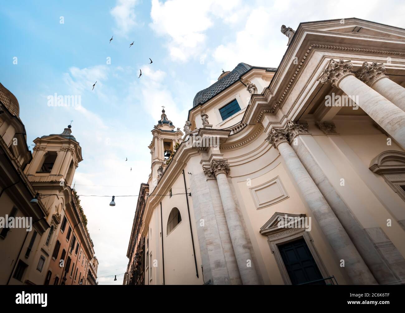 Baroque Church of Saint Mary in Montesanto at Piazza del Popolo in Rome under Blue Sky, Italy Stock Photo