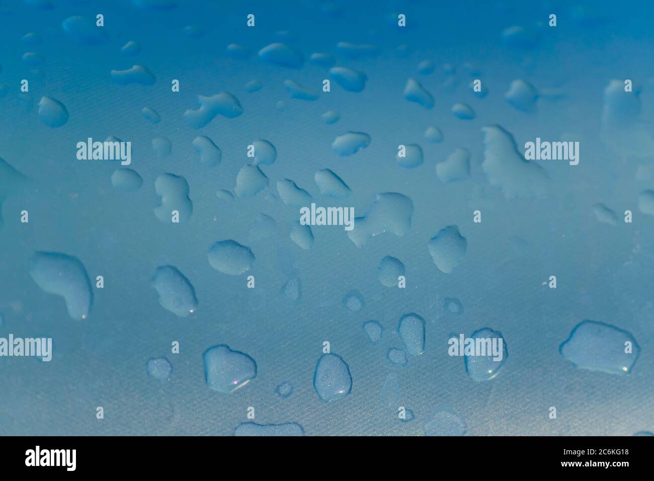 close up of water drops on Inflatable pool, background texture Stock Photo