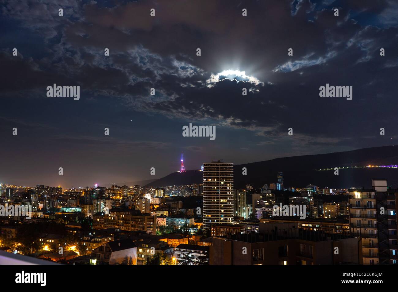 Moody sky in the night over Tbilisi's downtown, capital city of Georgia ...