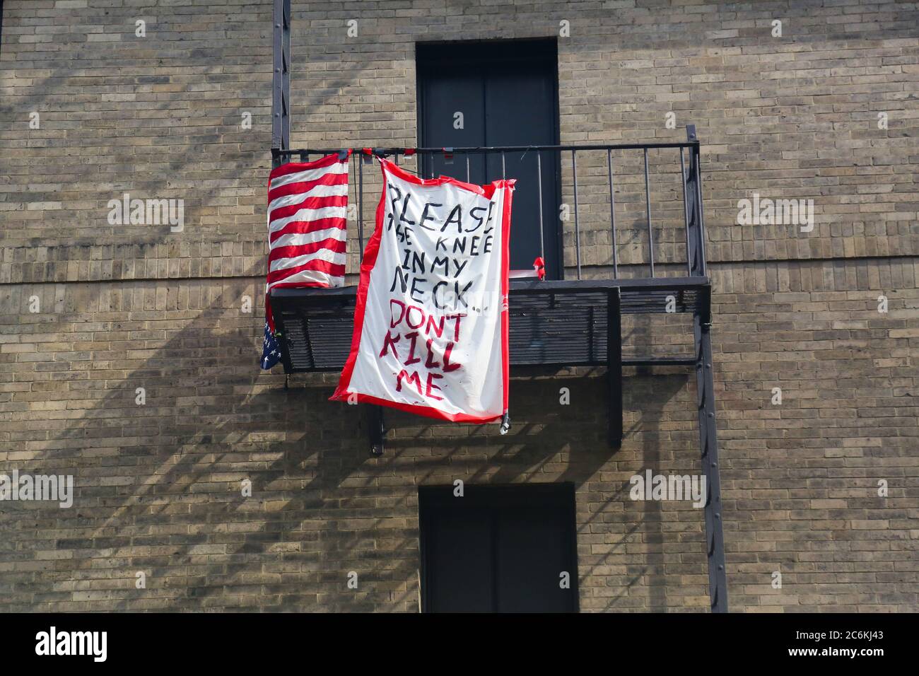 Cambridge Massachusetts Usa 8th July An Usa Flag With An Another Piece Of Clothes Written