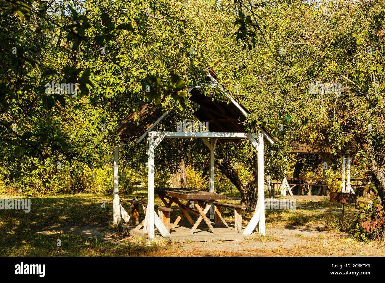 wooden gazebo in the autumn park Stock Photo - Alamy