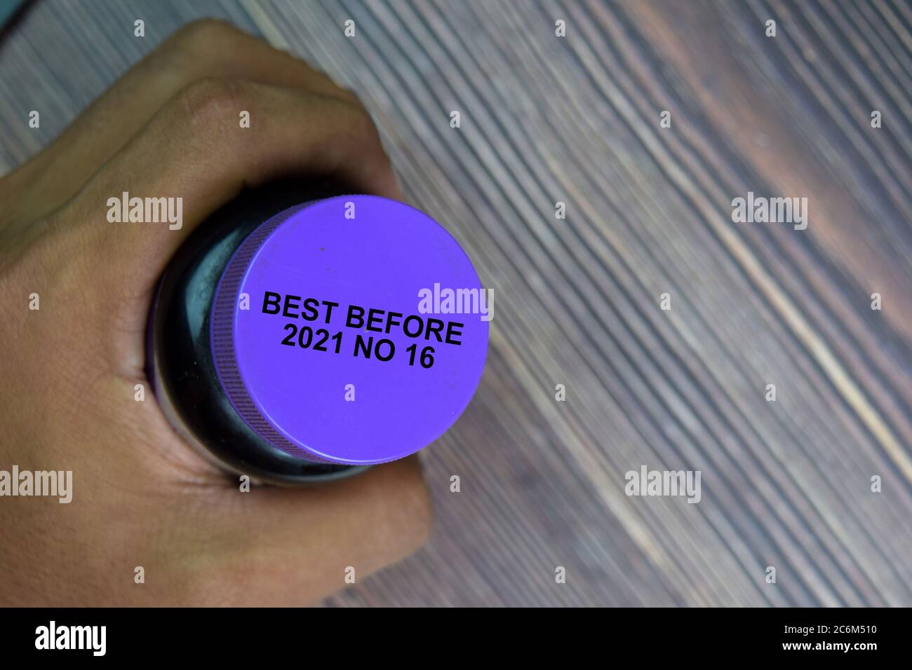 Close up text Best Before Date on Bottle Cap Food Stock Photo