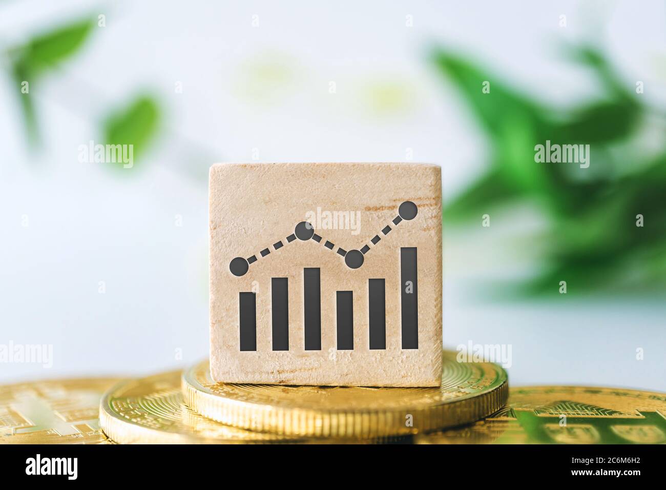 Objects Rising Graph Graph rising up growht exponencial sign on wooden cube with objects ...