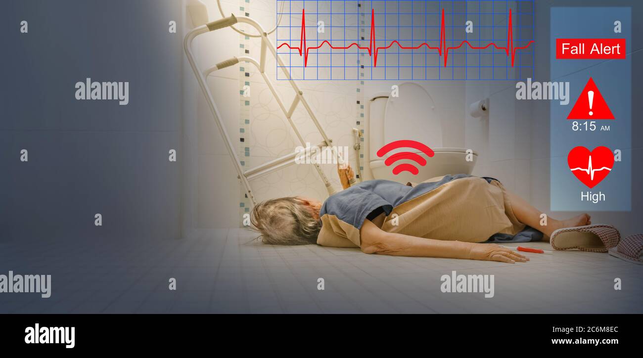 Medical fall accident detection is alert that elderly woman falling in bathroom because slippery surfaces Stock Photo